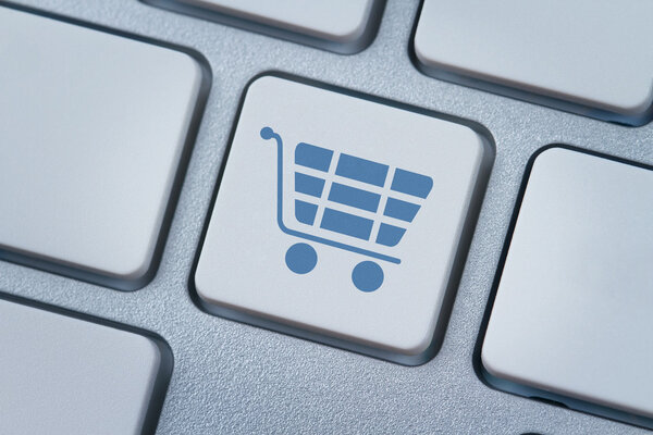 Shopping cart symbol at the computer key — Stock Photo, Image