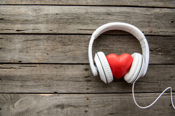 Headphones with red heart sign — Stock Photo, Image