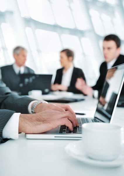 Business ambience, working on laptop during the meeting — Stock Photo, Image