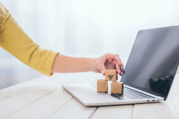 Cropped View Woman Putting Small Paper Box Laptop — Stock Photo, Image