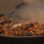 Traditional meat in smoke in Christmas market in Wroclaw, Poland