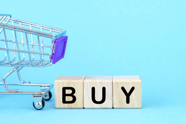 Wooden Cubes Word Buy Basket Cart Purchase Buy Concept Buying — Stock Photo, Image