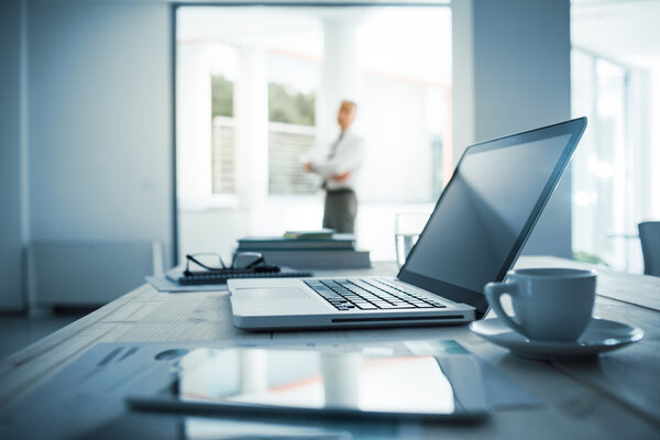 Executive standing in his office — Stock Photo, Image