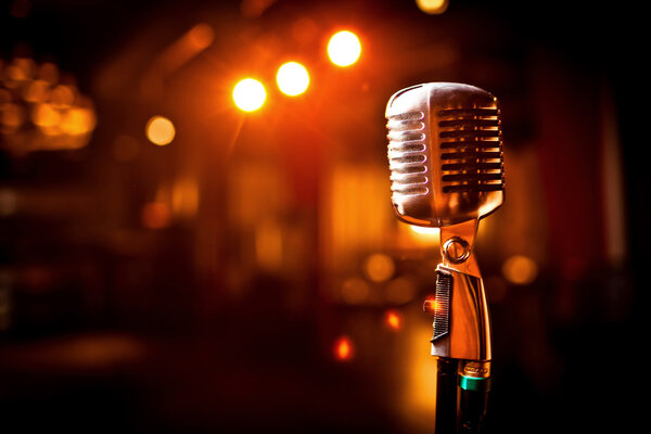 Retro microphone on stage — Stock Photo, Image